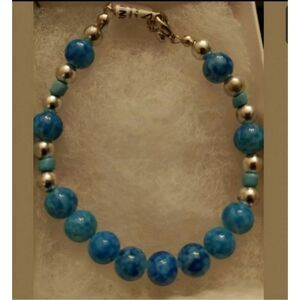 Handmade 7" bracelet Glass Blue bead w/ silver see